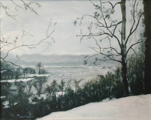 Snow on the James — a winter landscape by Nick Skaltsounis depicting snowy trees, a frozen river, and distant mountains beneath a soft gray sky.